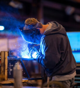 Chance Rides employee working on ride.